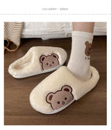 Winter slippers Cozy indoor footwear Soft warm house shoes Fuzzy winter slippers Plush indoor slippers Comfortable home footwear Cold weather comfort shoes Snug house slippers Warm fuzzy slip-ons Indoor comfort footwear